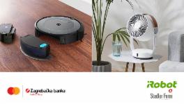 Robot čistač na podu i ventilator na stolu