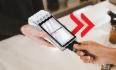 Hand with a card and POS